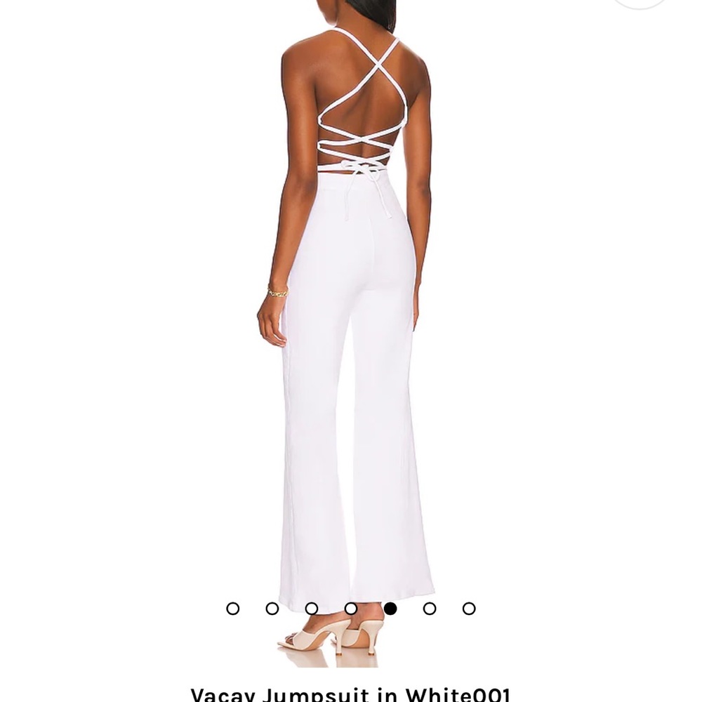 Good American White vacay jumpsuit. Worn once at my wedding rehearsal! Size 0